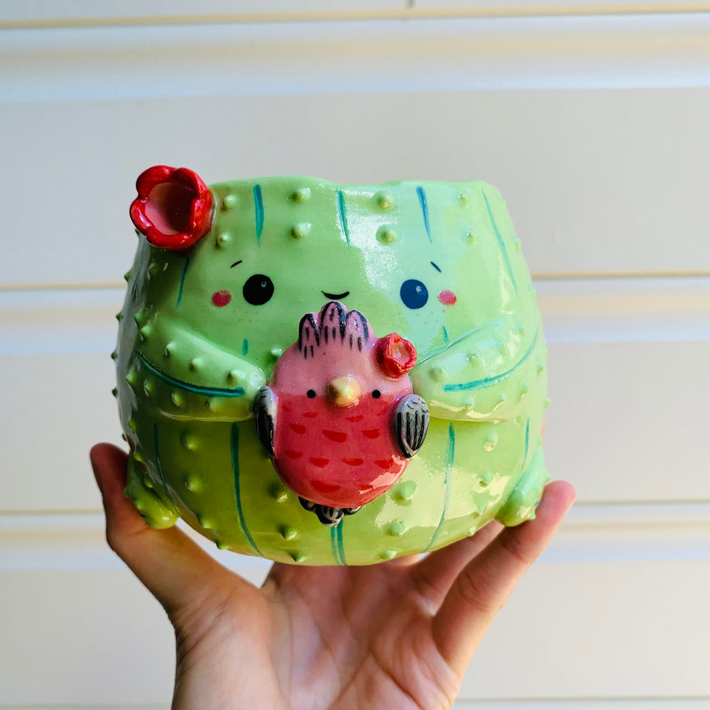 Flowery cactus pot with pink galah friend, photo 1 of 8