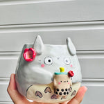 Totoro pot with bubble tea friend