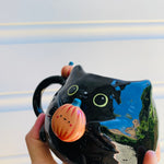 Black cat mug with pumpkin friends