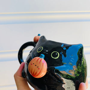 Black cat mug with pumpkin friends