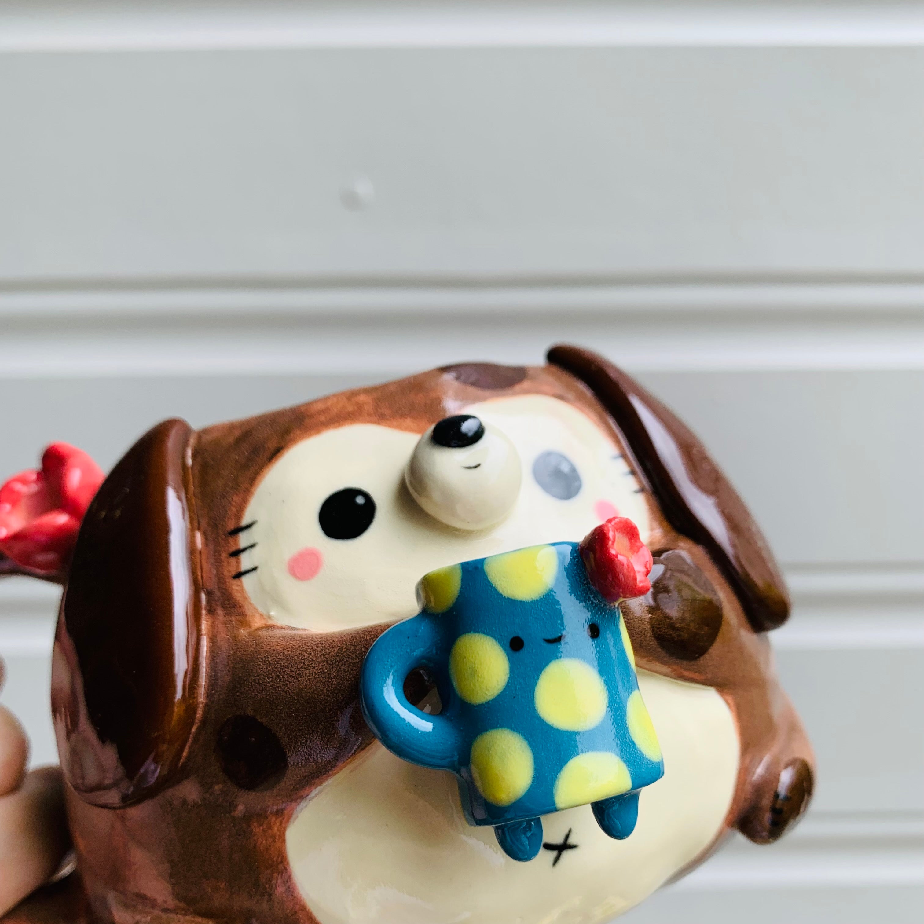 Brown DOGGO coffee pun mug with mug friend