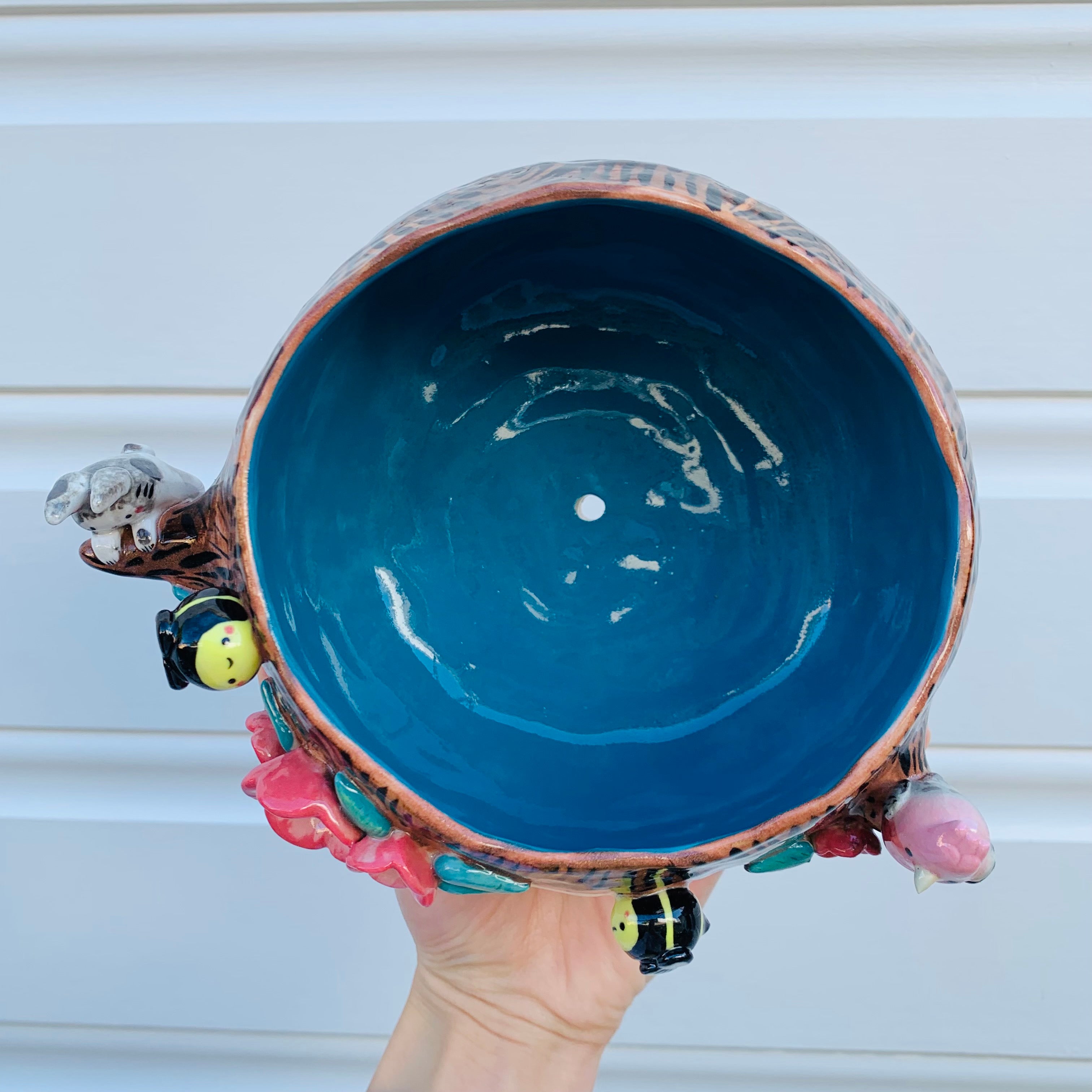 Happy flowery tree with bees, bunny and pink galah planter