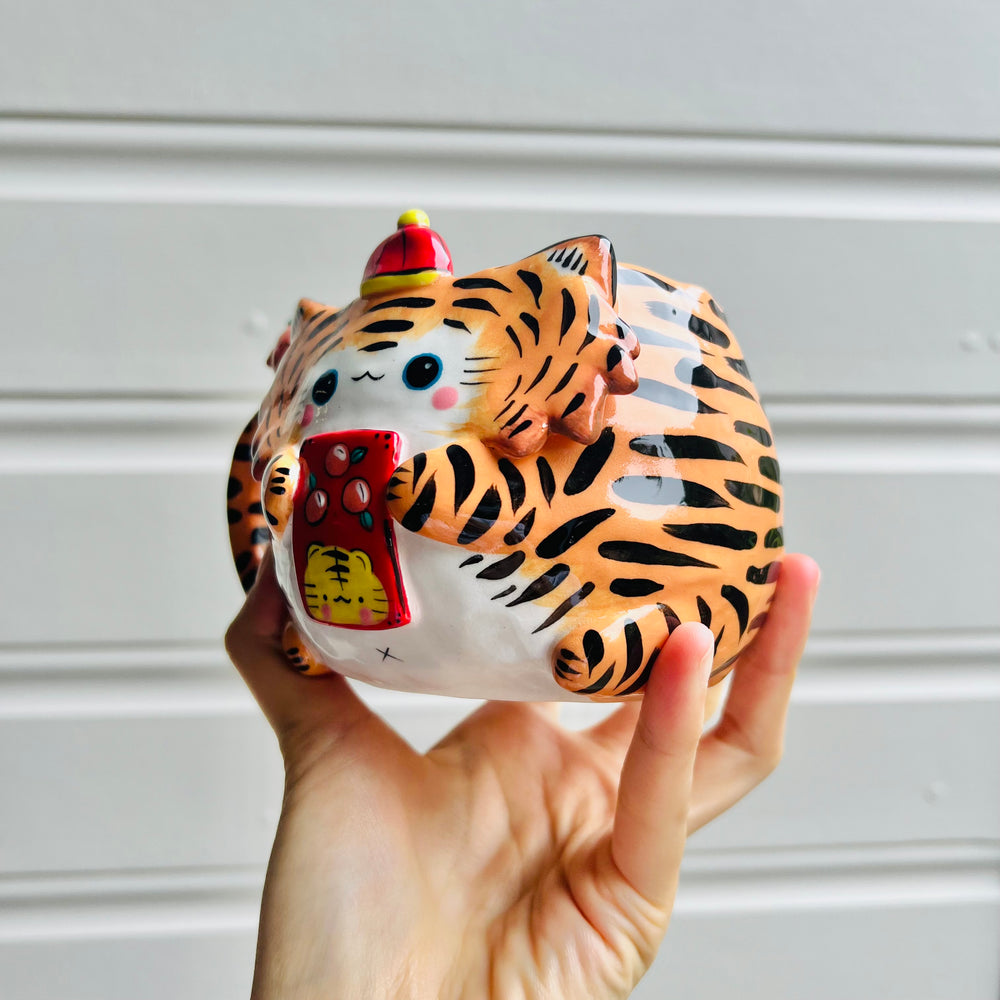 Hat wearing tiger and mandarin friend mug with red packet, photo 3 of 5