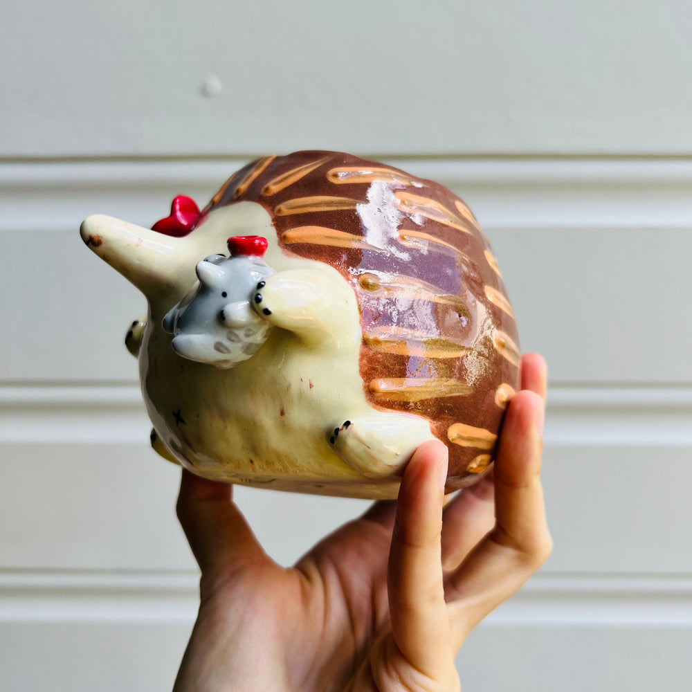 Flowery Echidna pot with Puggle baby, photo 3 of 5