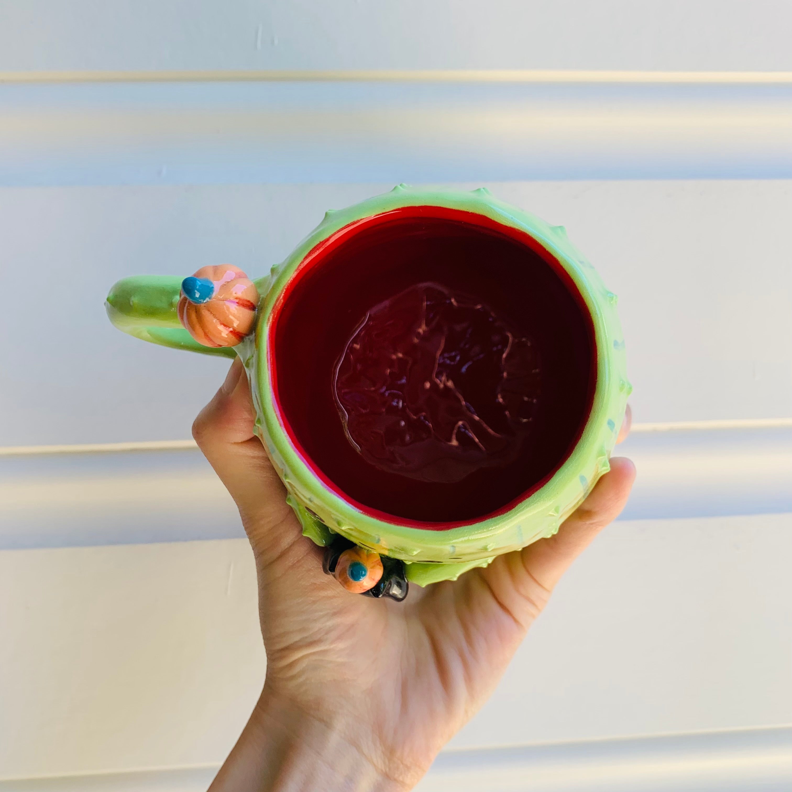 Pumpkin cactus mug with black cat friend