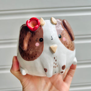 Flowery goat pot