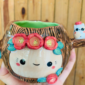 Happy tree pot with spotty cat friends