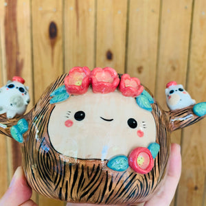 Happy tree pot with spotty cat friends