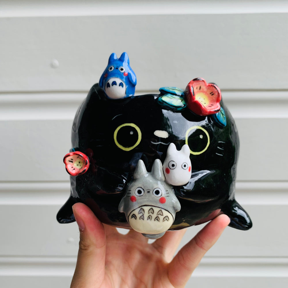 Flowery black cat pot with Totoro friends, photo 1 of 10