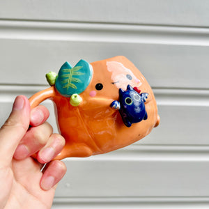 Halloween pumpkin mug with bat friend