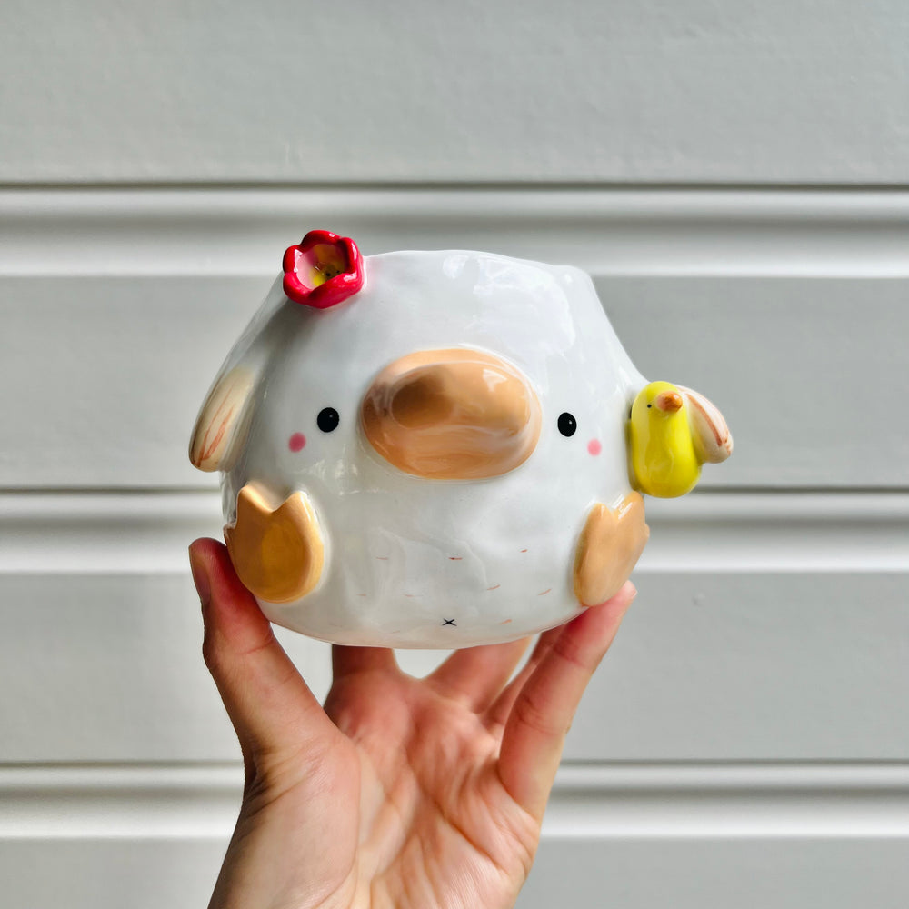 Flowery duck pot with duck friend, photo 1 of 7