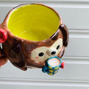 Brown DOGGO coffee pun mug with mug friend