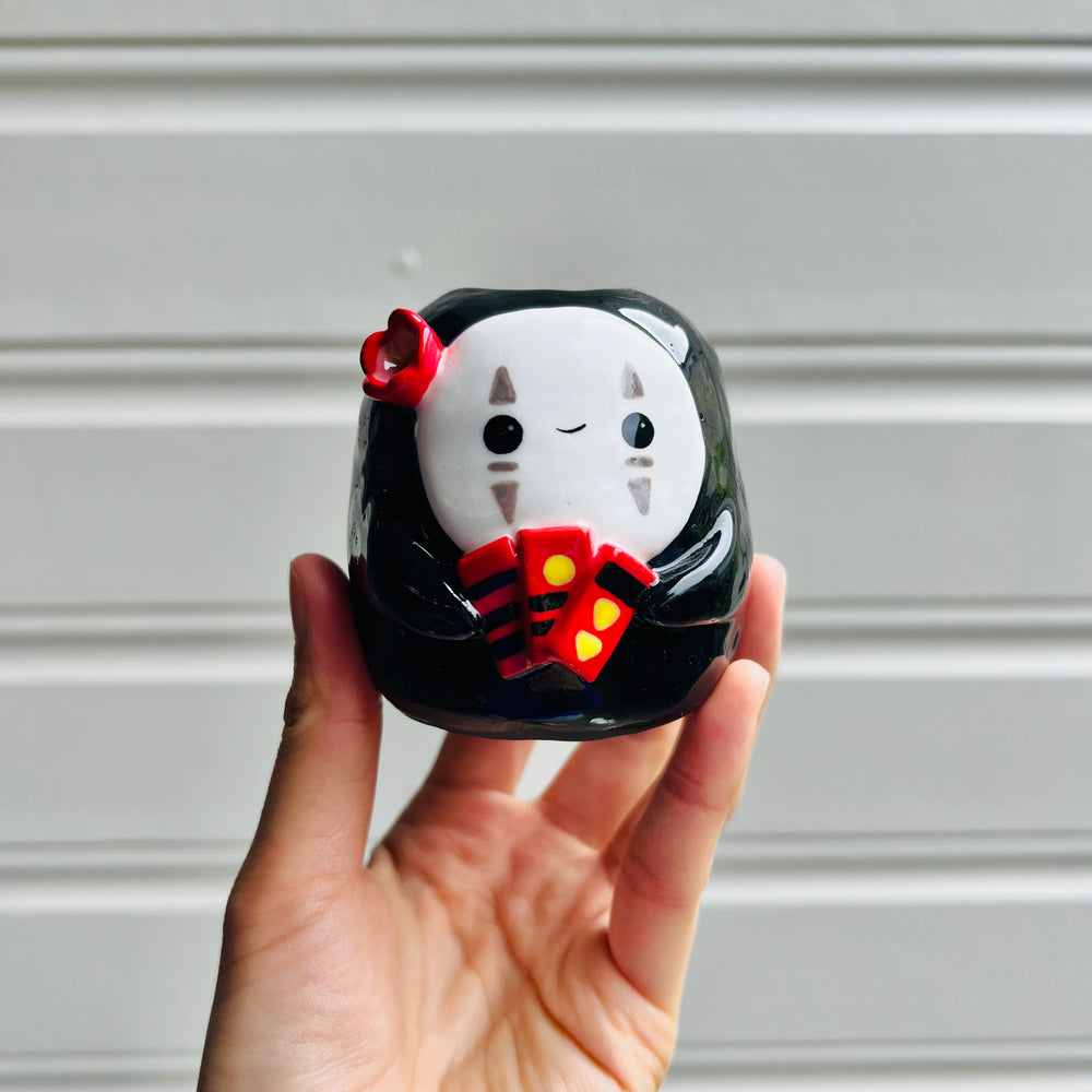 No Face vase with bath tokens, photo 1 of 5