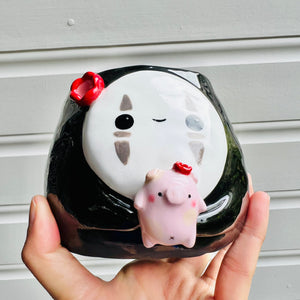 No Face pot with pig friend