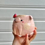 Flowery pig pot