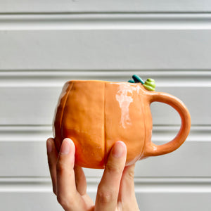 Halloween pumpkin mug with ghost friend