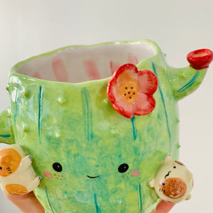 Flowery cactus pot with cat friends