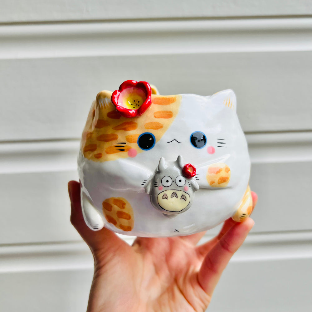 Ginger cat pot with Totoro friend, photo 1 of 5