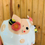 Cream spotty doggo pot with bee friends