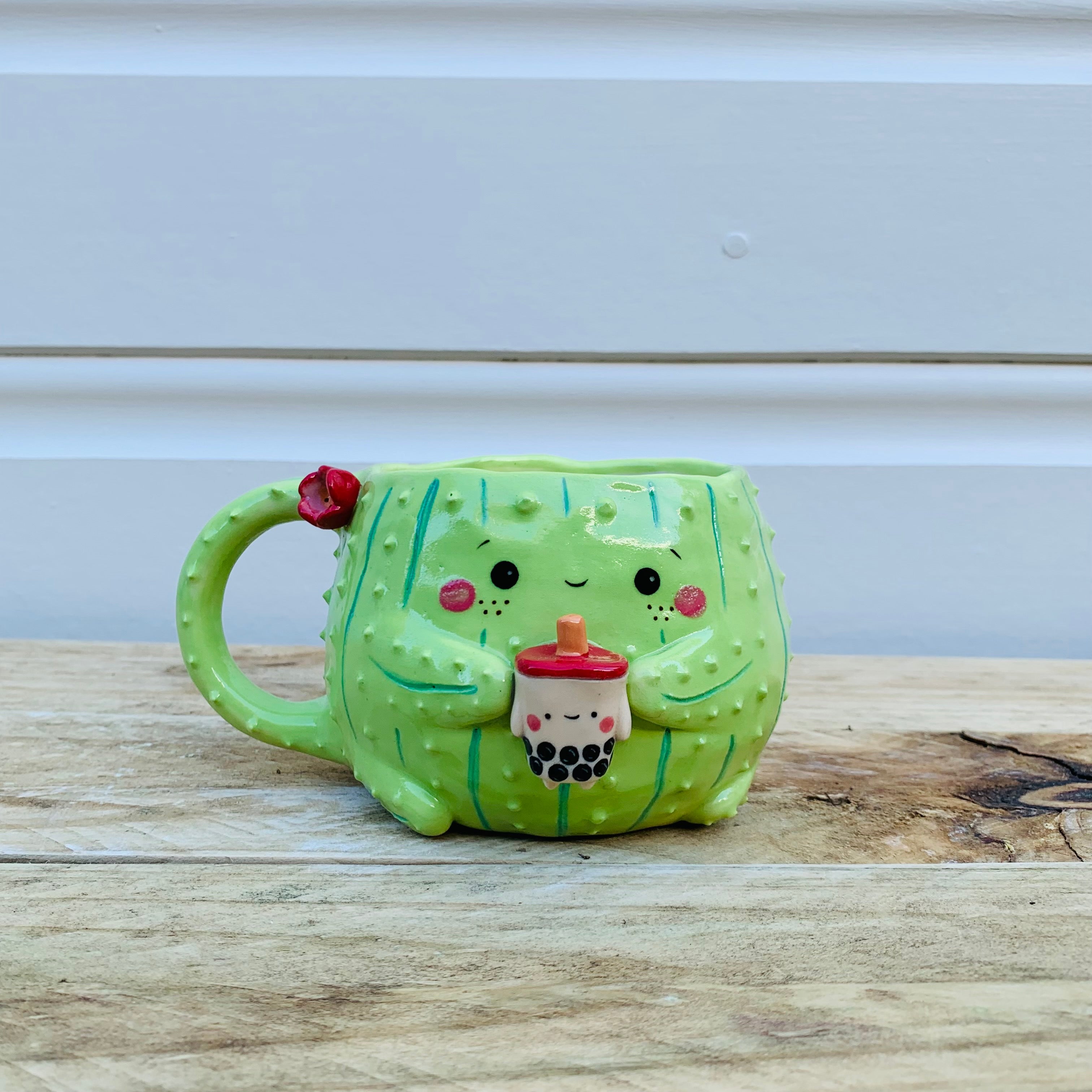 Light green flowery cactus mug with bubble tea friend