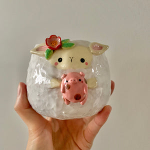 Flowery lamb pot with pig friend