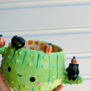 Pumpkin cactus pot with black cat friends