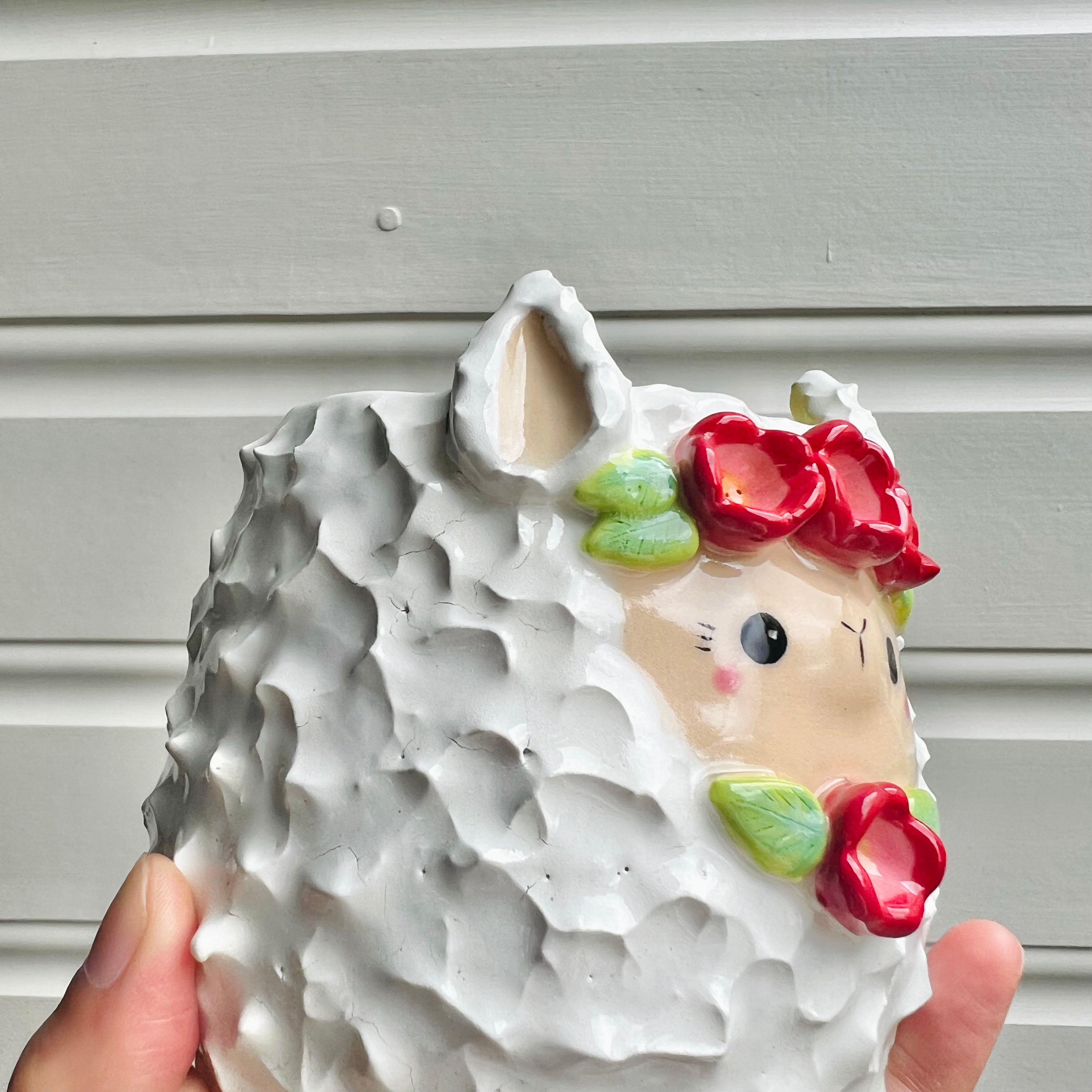 Flowery llama pot