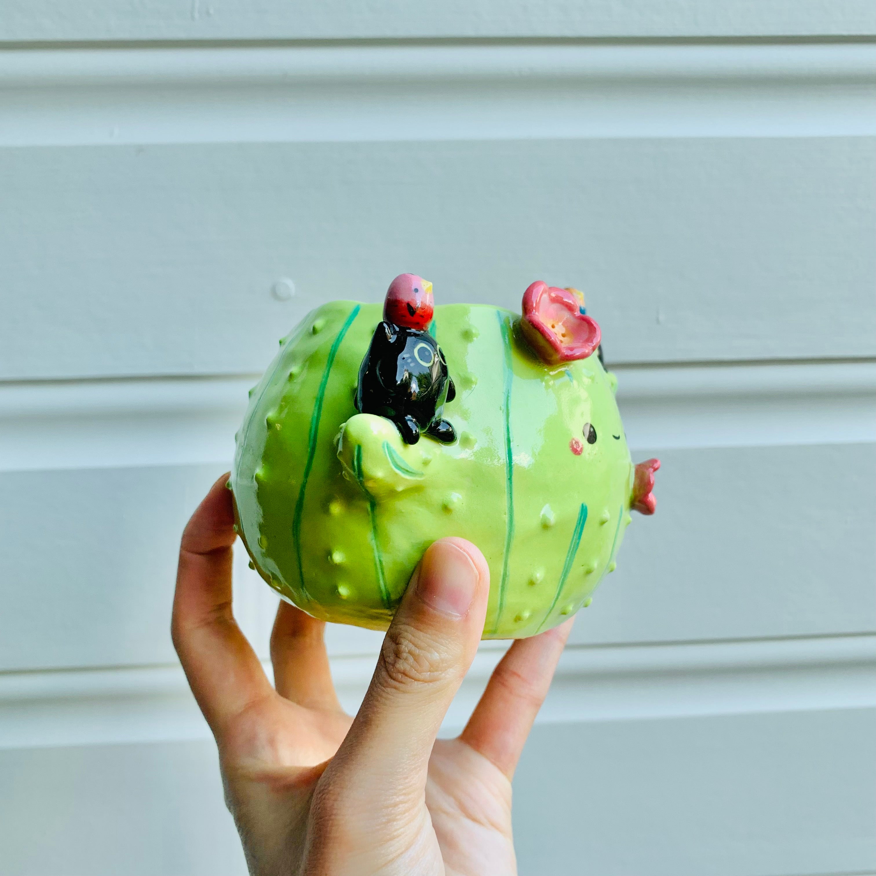 Flowery cactus pot with black cats and bird friends