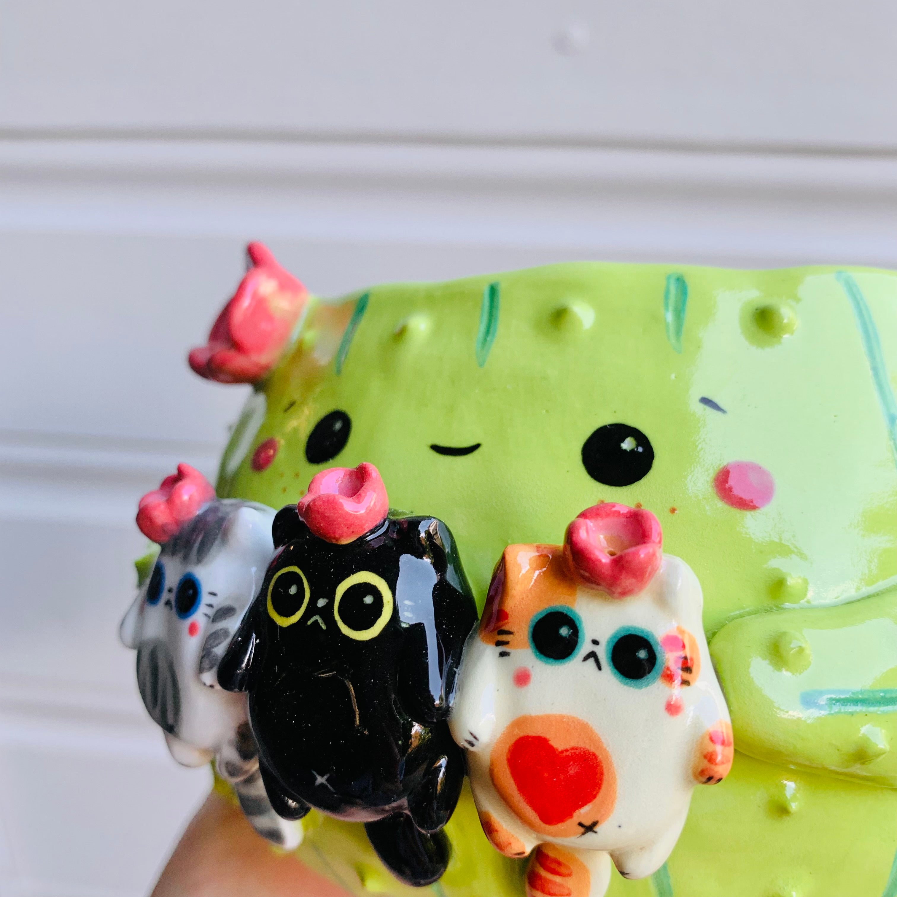 Flowery cactus pot with cat friend trio