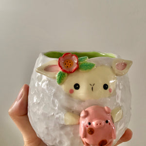 Flowery lamb pot with pig friend