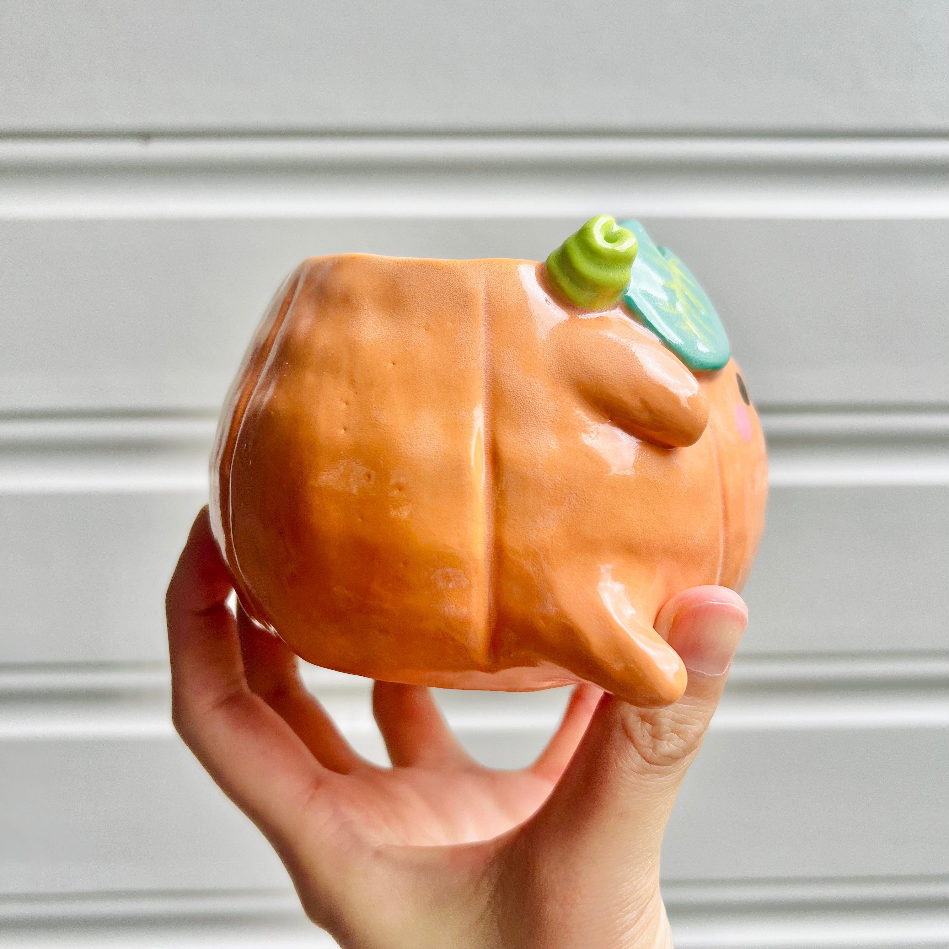 Halloween pumpkin pot with bat friend