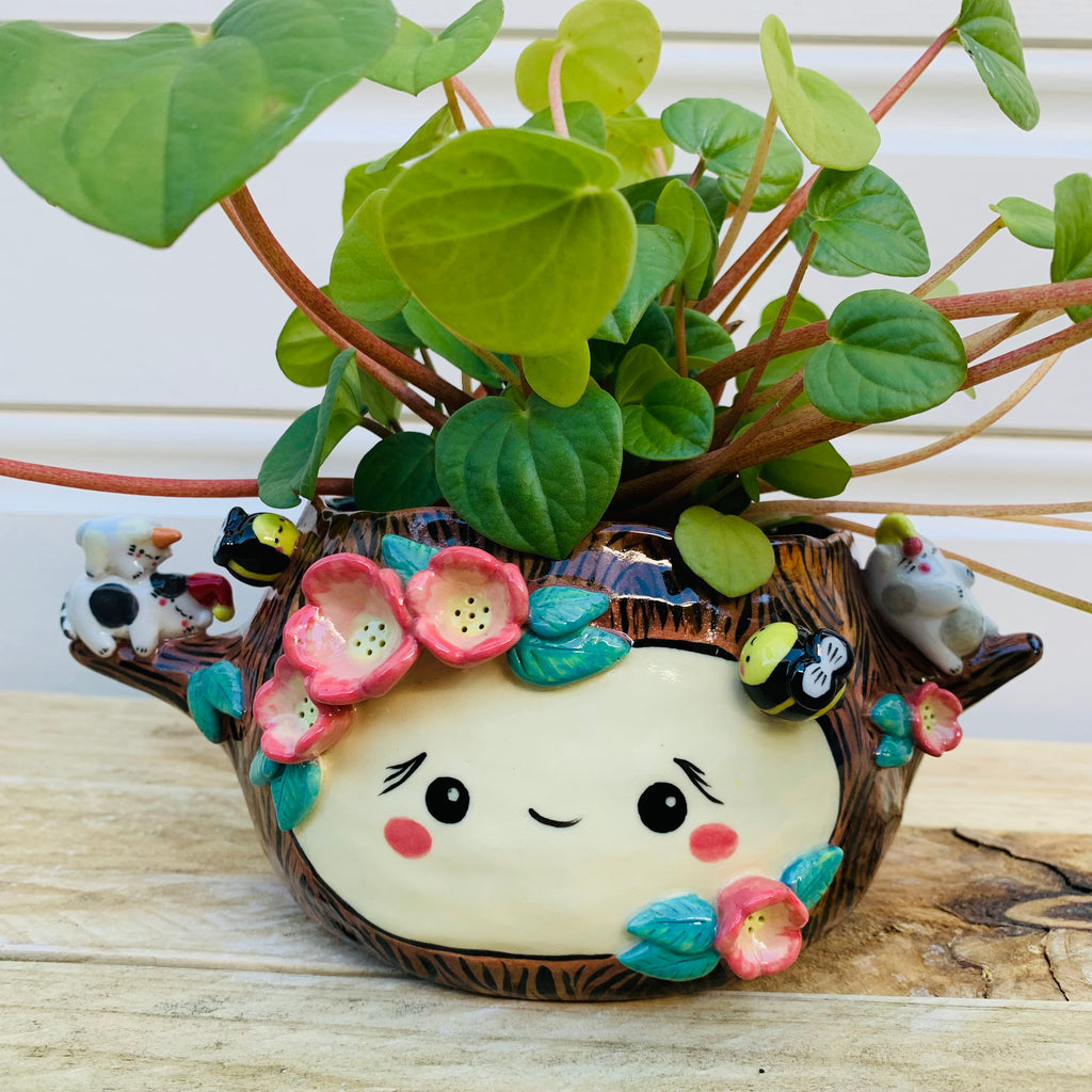 Happy flowery tree with bees and sleepy cats planter