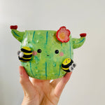 Flowery cactus pot with bee friends