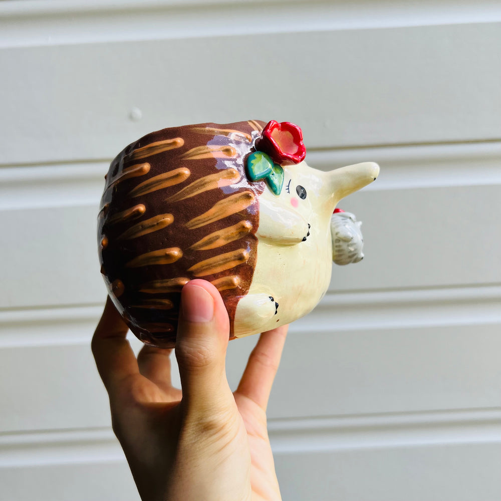 Flowery Echidna pot with Puggle baby, photo 2 of 5