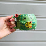 Dark green CACTUS coffee pun mug with mug friend