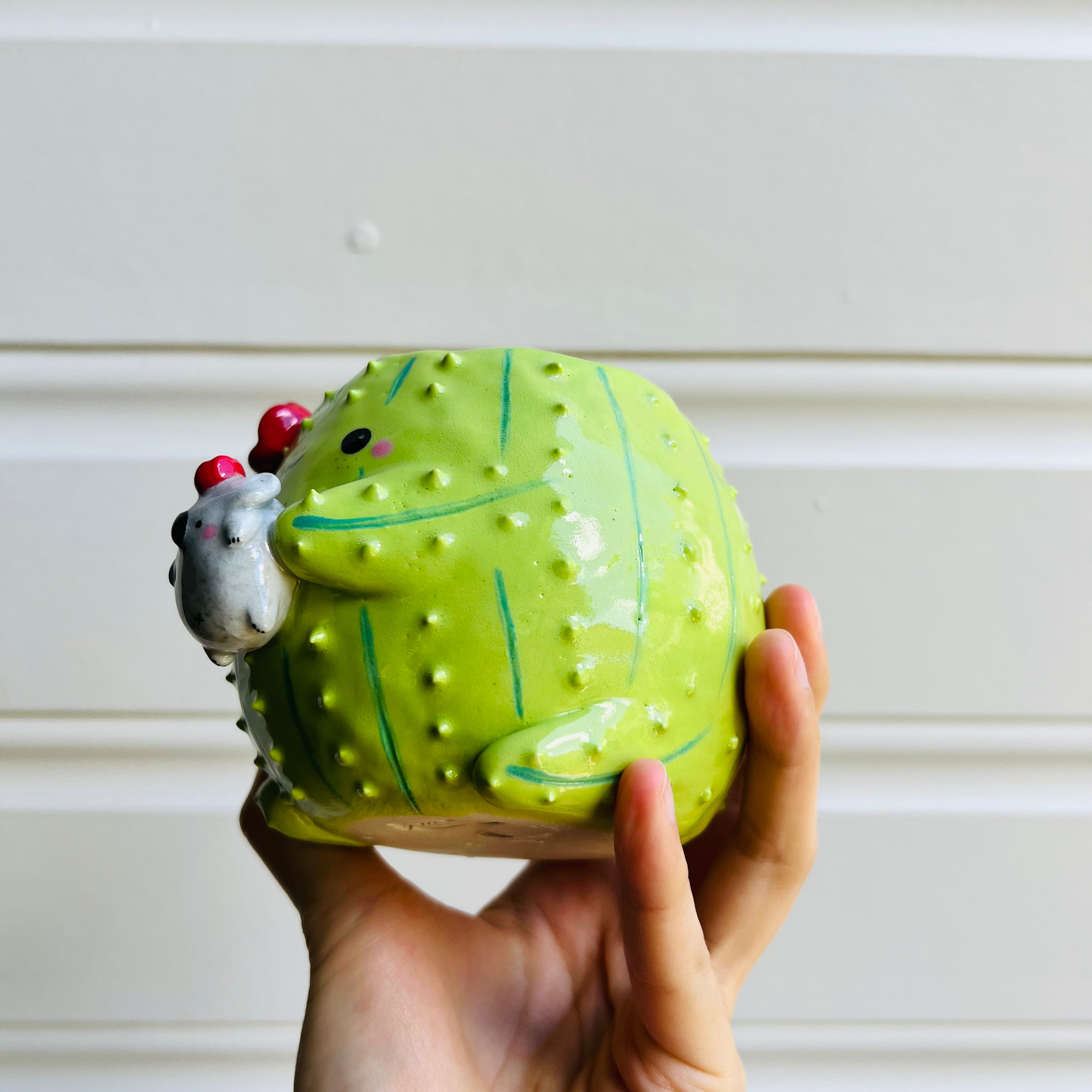 SECONDS: Flowery cactus pot with koala friend