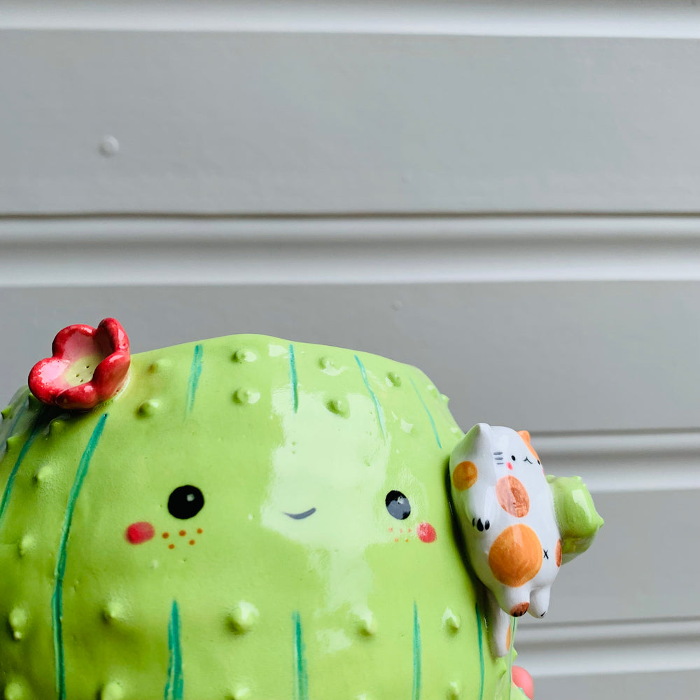 Rotund flowery cactus pot with cat friend, photo 2 of 8