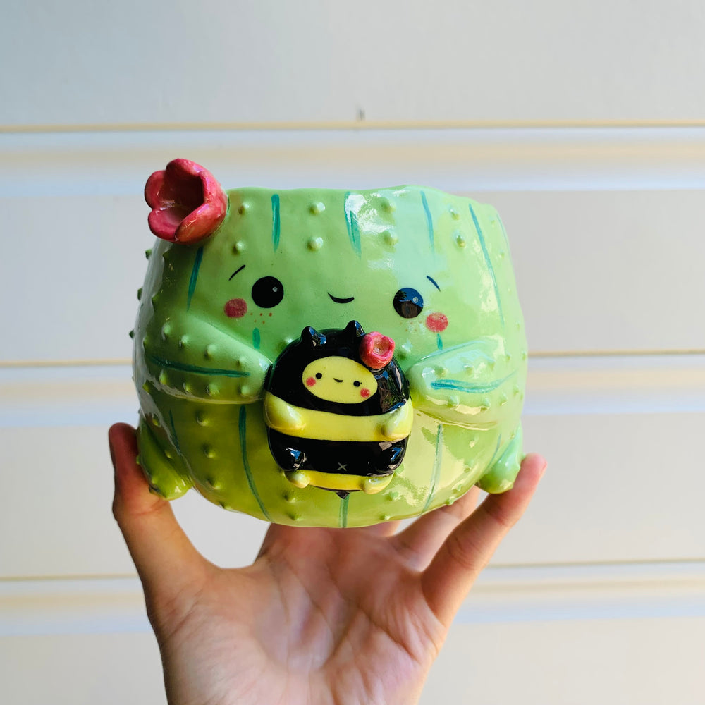 Flowery cactus pot with bee friend, photo 1 of 9