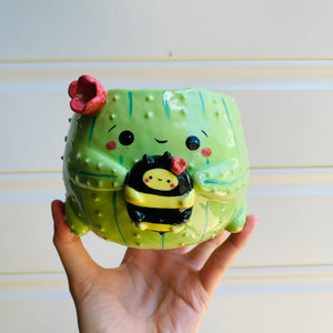 Flowery cactus pot with bee friend