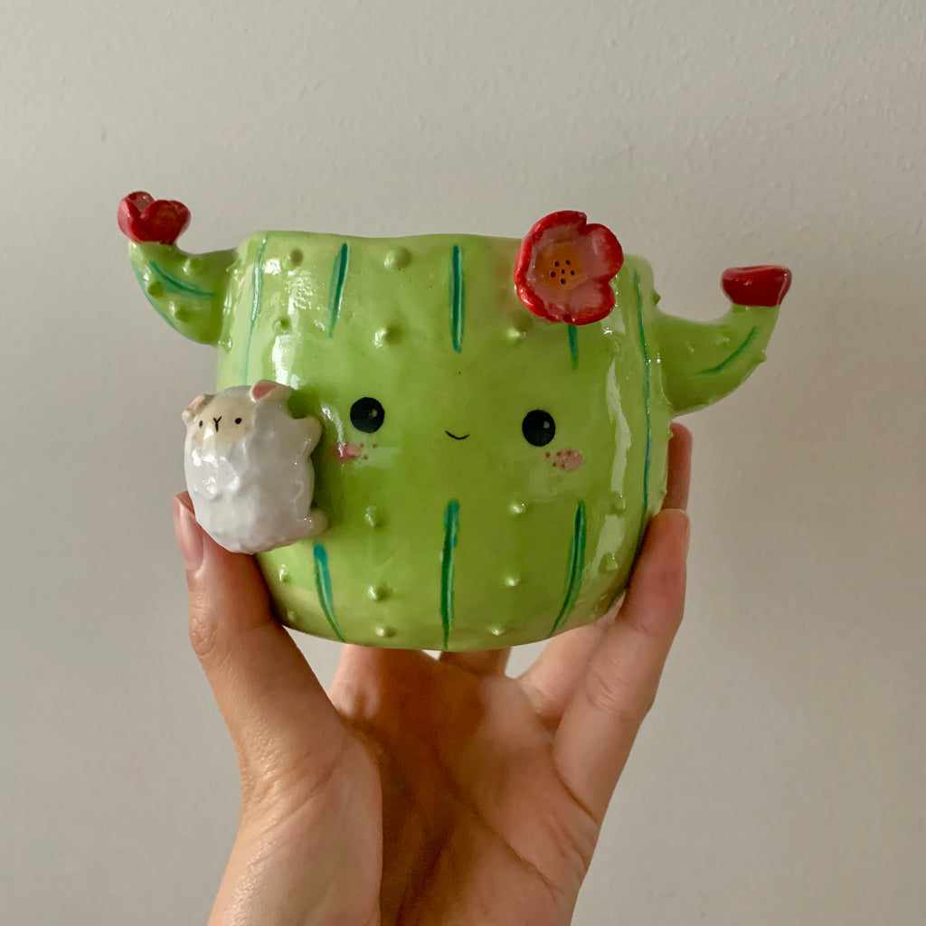 Flowery cactus pot with lamby friend