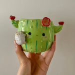 Flowery cactus pot with lamby friend