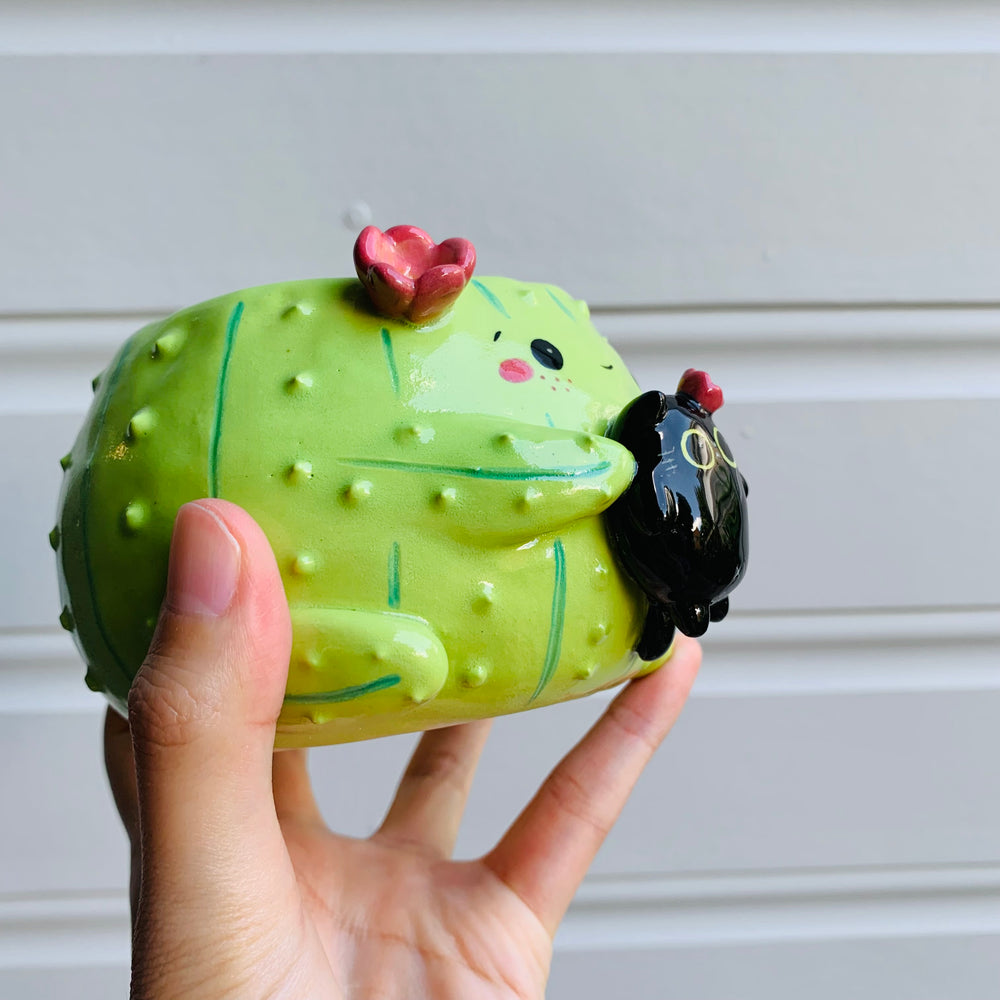 Flowery cactus pot with black cat friend, photo 2 of 6