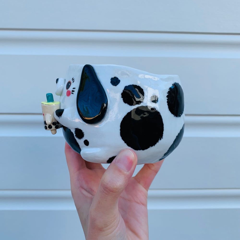 Black and white spotty doggo with bubble tea mug, photo 5 of 10