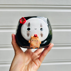 No Face pot with ginger cat friend