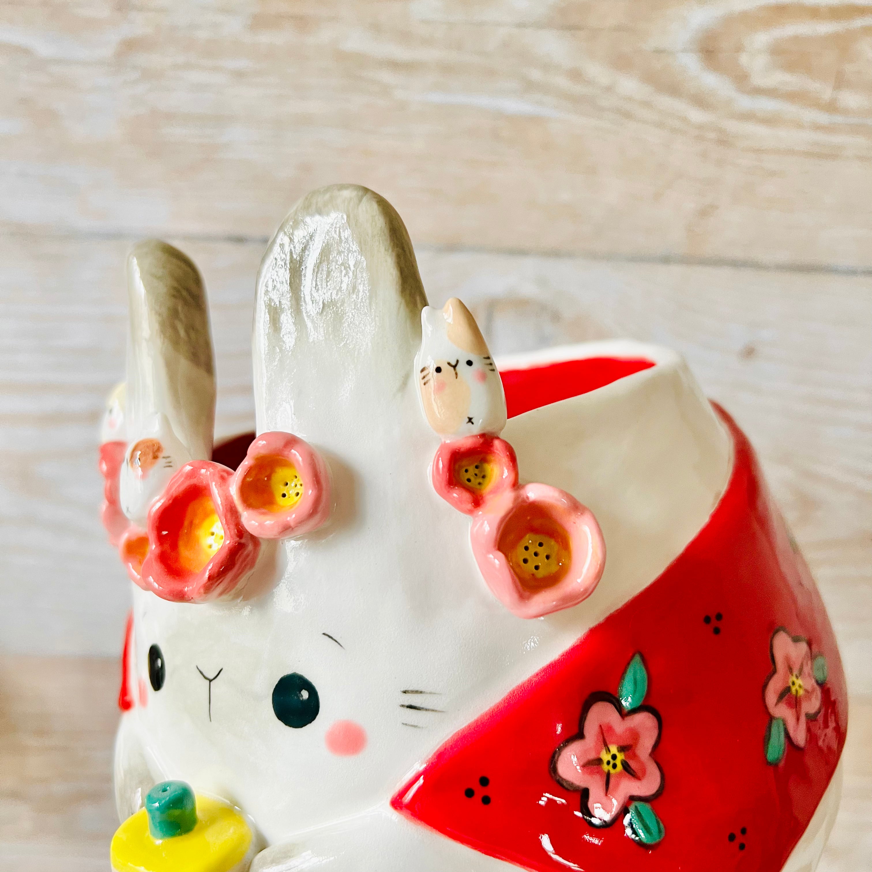 LNY cape wearing flowery Bunny pot with BBT and bunny friends