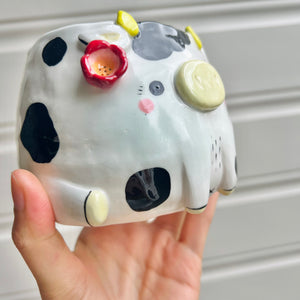 Flowery cow pot