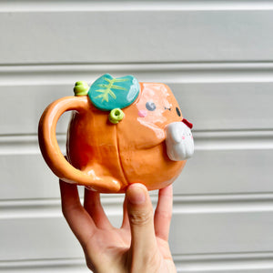 Halloween pumpkin mug with ghost friend