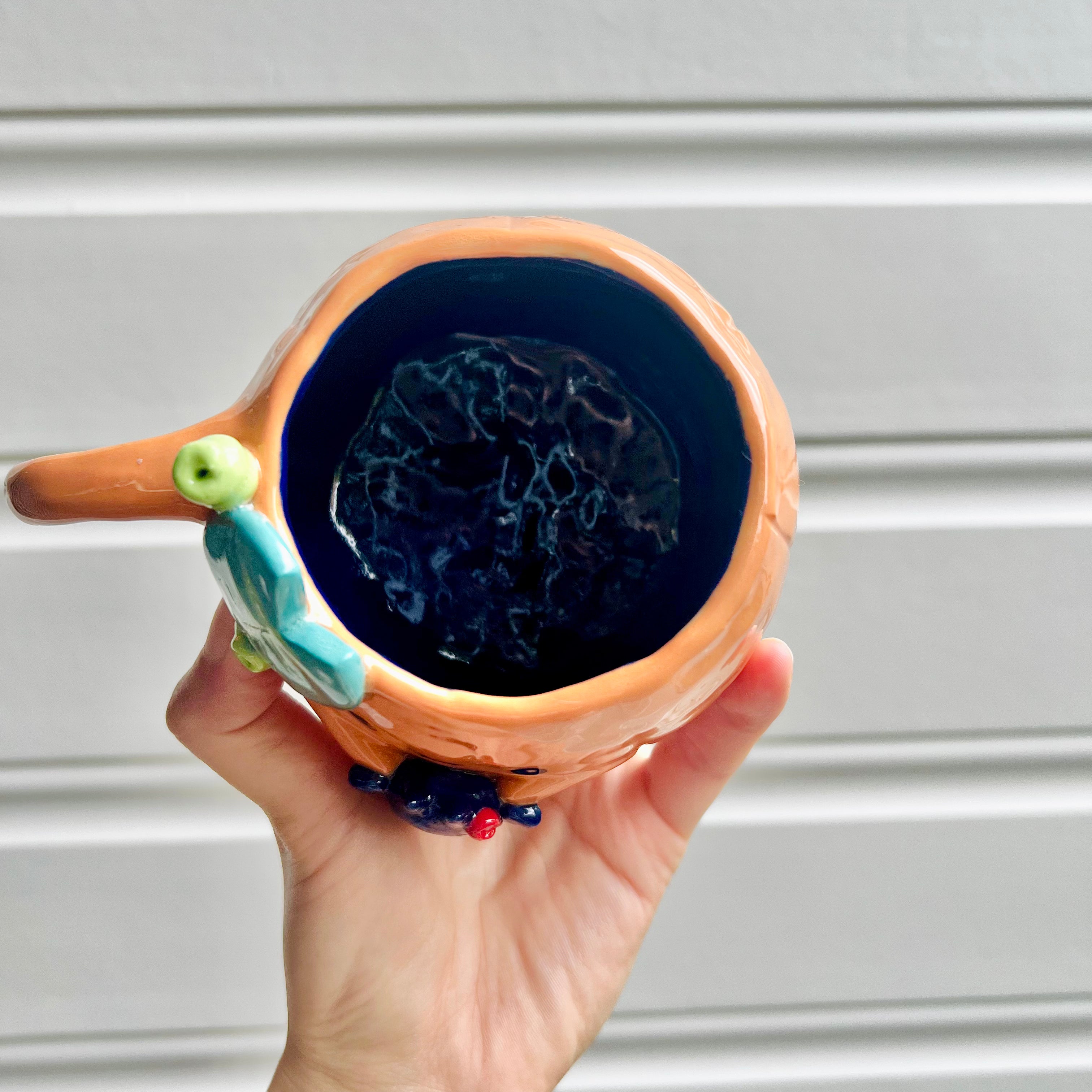 Halloween pumpkin mug with bat friend