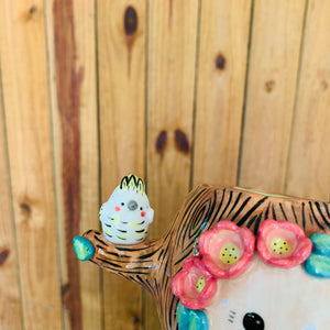 Happy tree pot with cockatoo friends