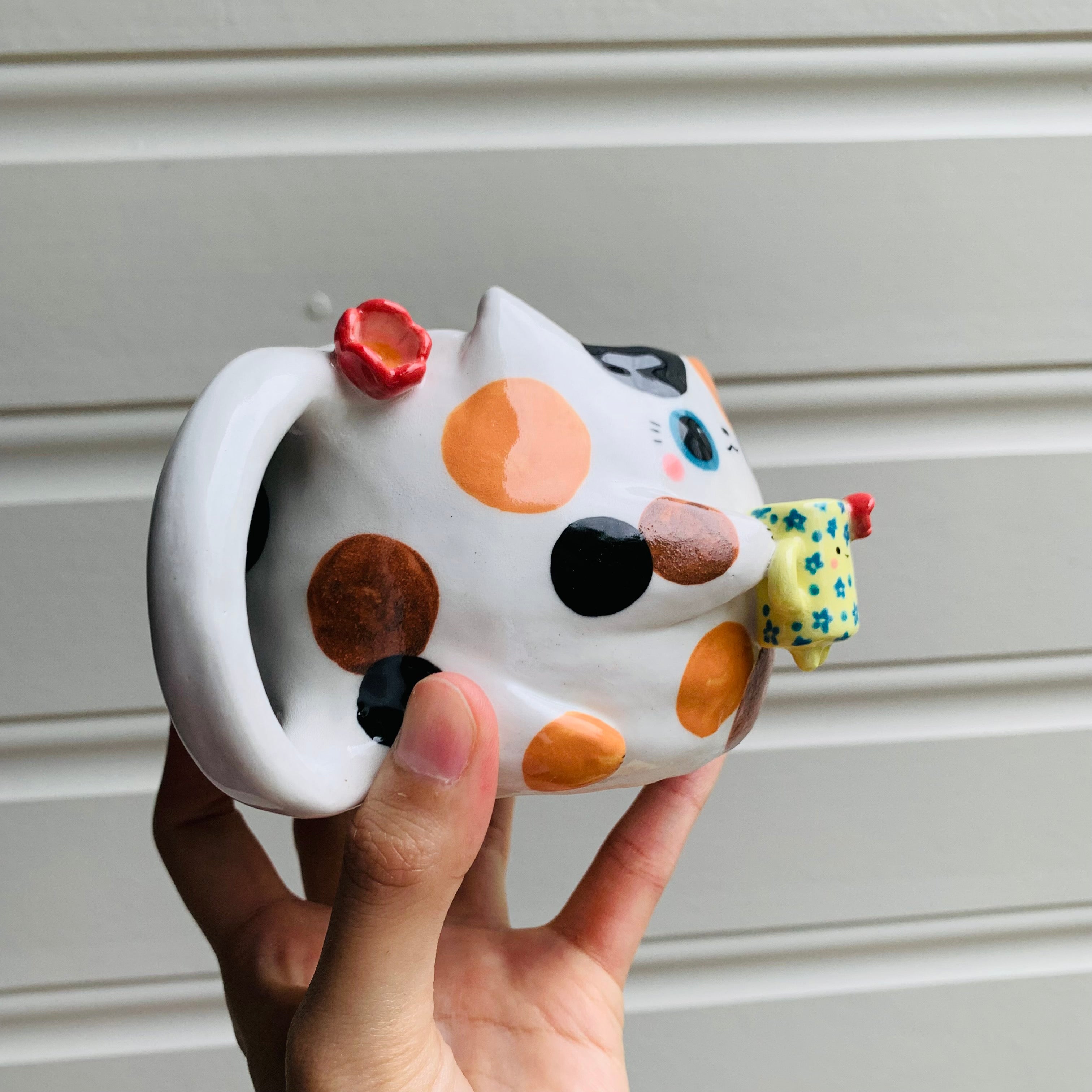 Spotty KITTY coffee pun mug with mug friend